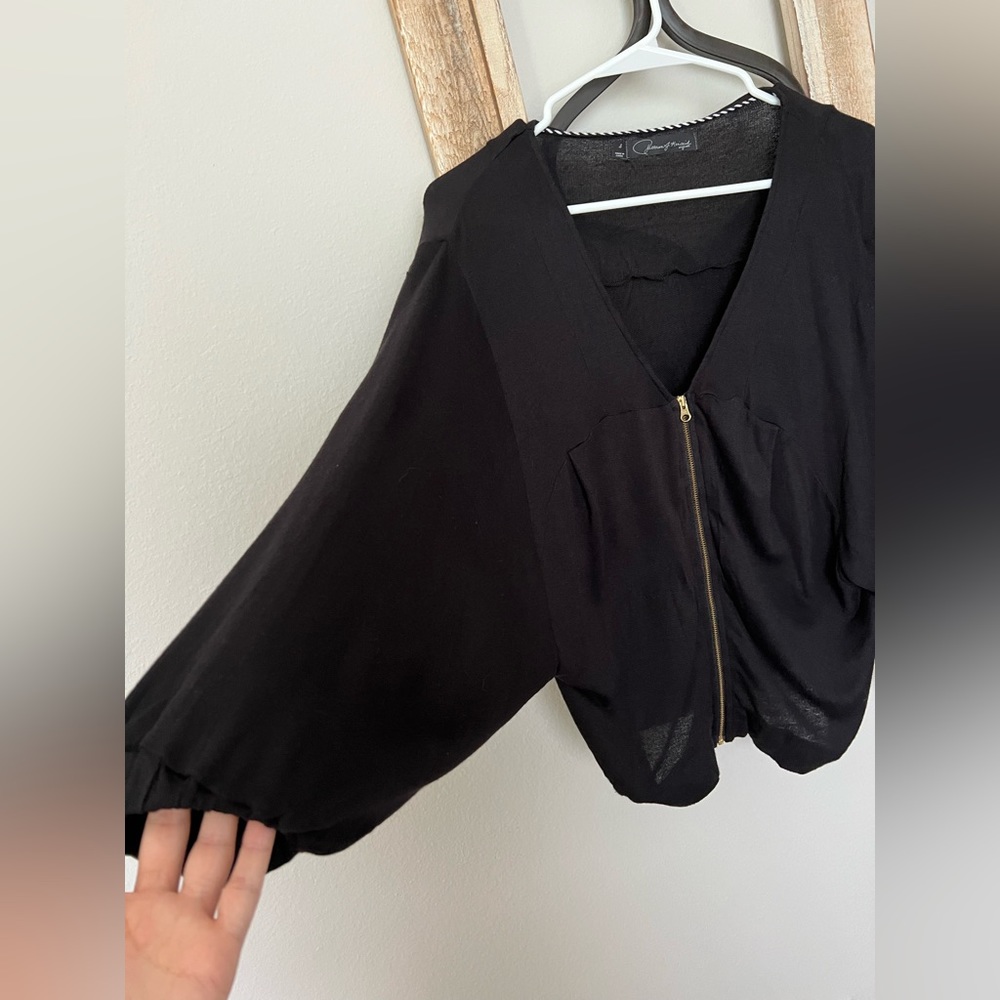 Bat/flare wing sweater